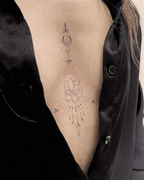 feminine underbreast tattoo|Under breast tattoos for women